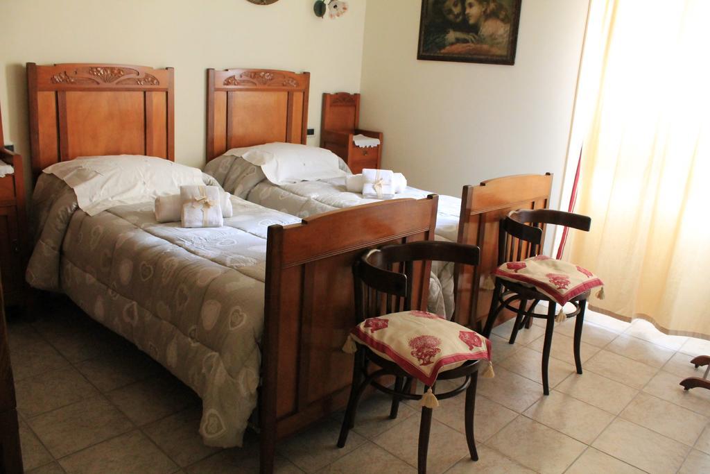 Da Agnese Locazioni Brevi Hotel กาญารี ห้อง รูปภาพ
