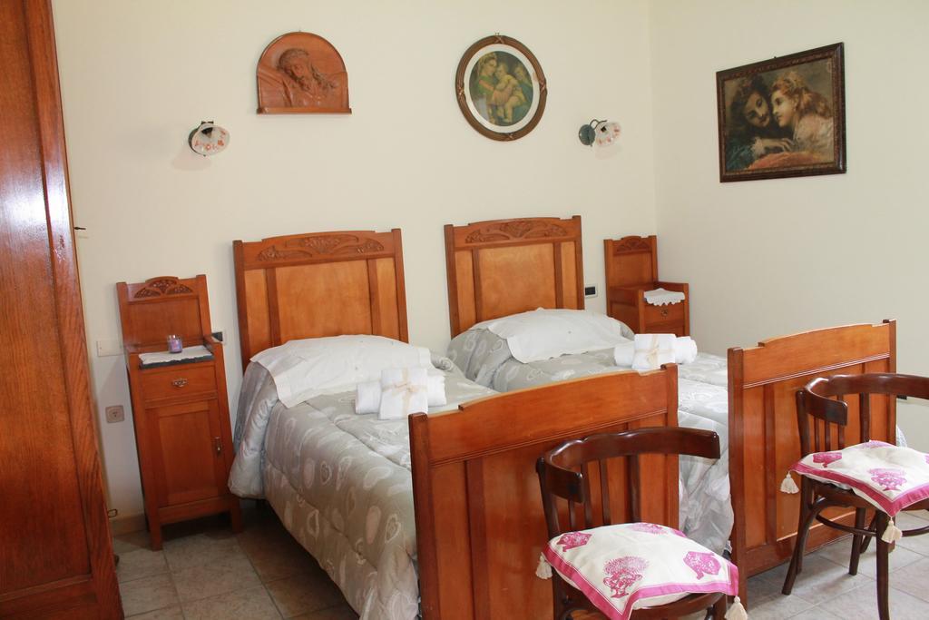 Da Agnese Locazioni Brevi Hotel กาญารี ห้อง รูปภาพ